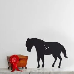 PONY CLOCK WITH WAGGING TAIL